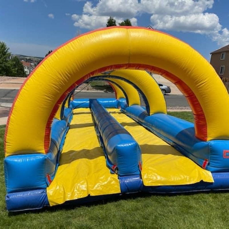 25ft Two-Person Slip N Slide rental in Pueblo and Colorado Springs - Colorado Bounce Club